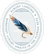 A circular seal featuring a stylized bird in flight with a dotted blue background, "ALBURY LANDING" around the edge, and a light blue border.